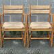 Paire de fauteuils années 50 paille et bois