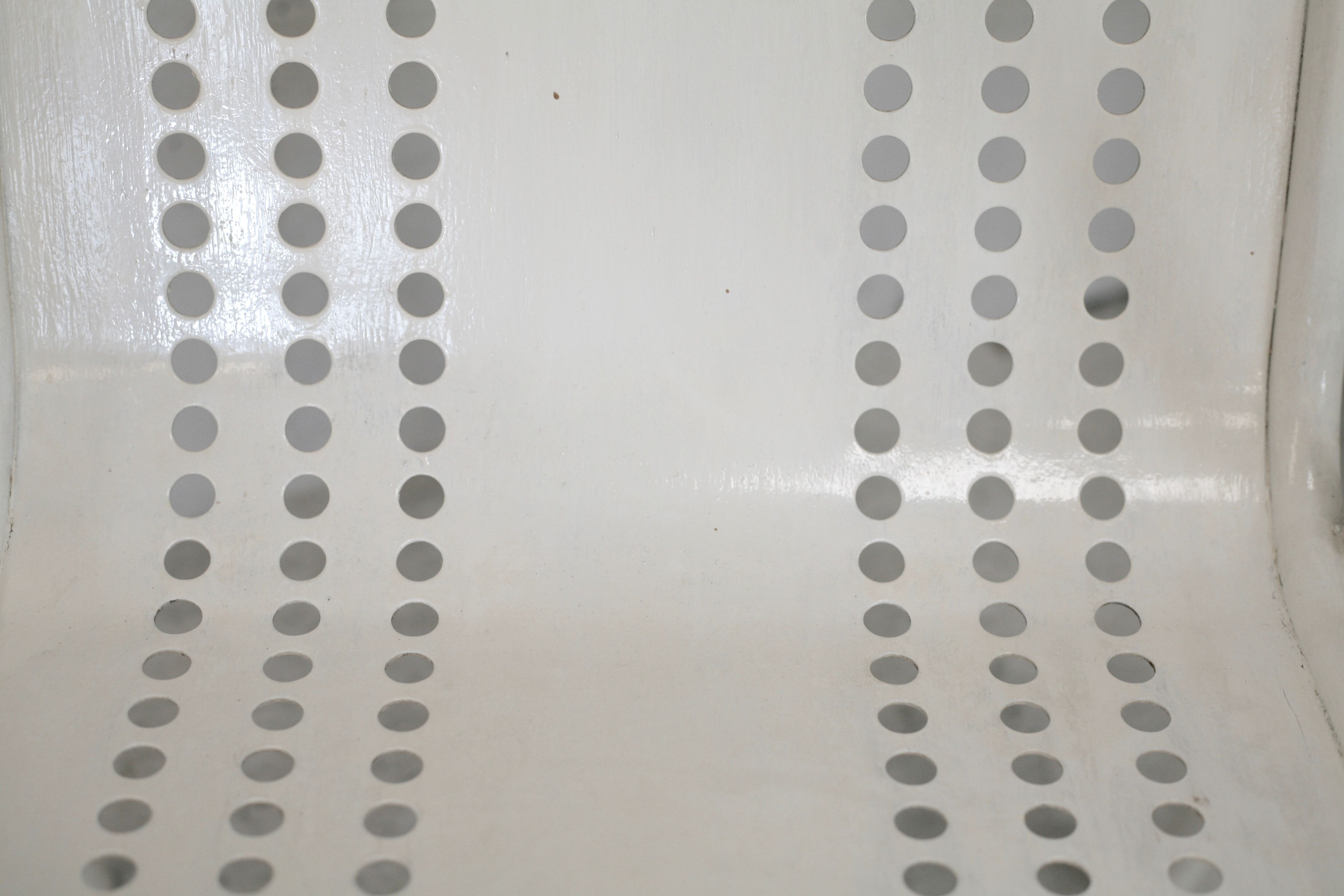 Pair of honeycomb steel armchairs. France, circa 1950.