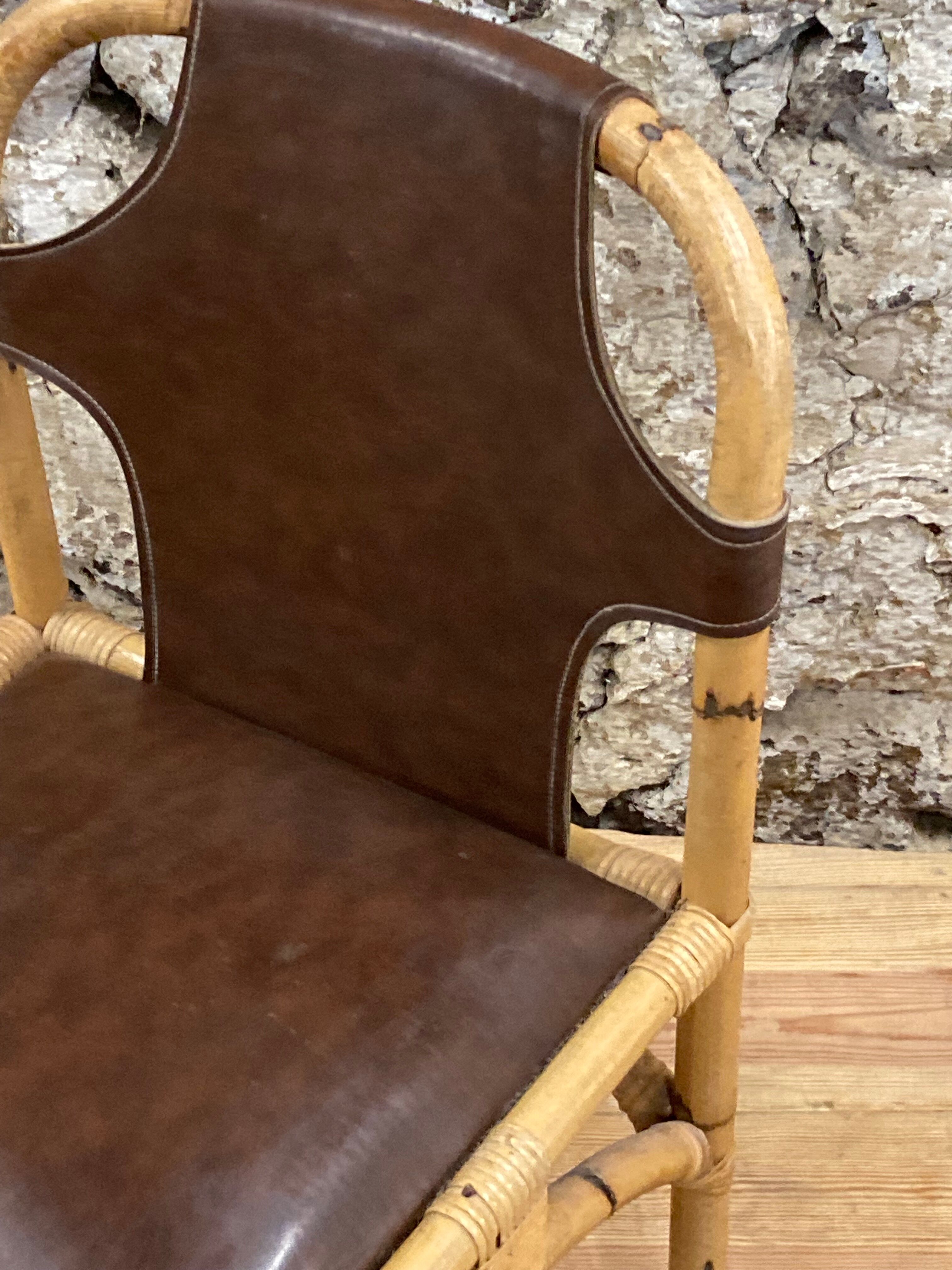 Vintage chair in rattan and bamboo and brown leather