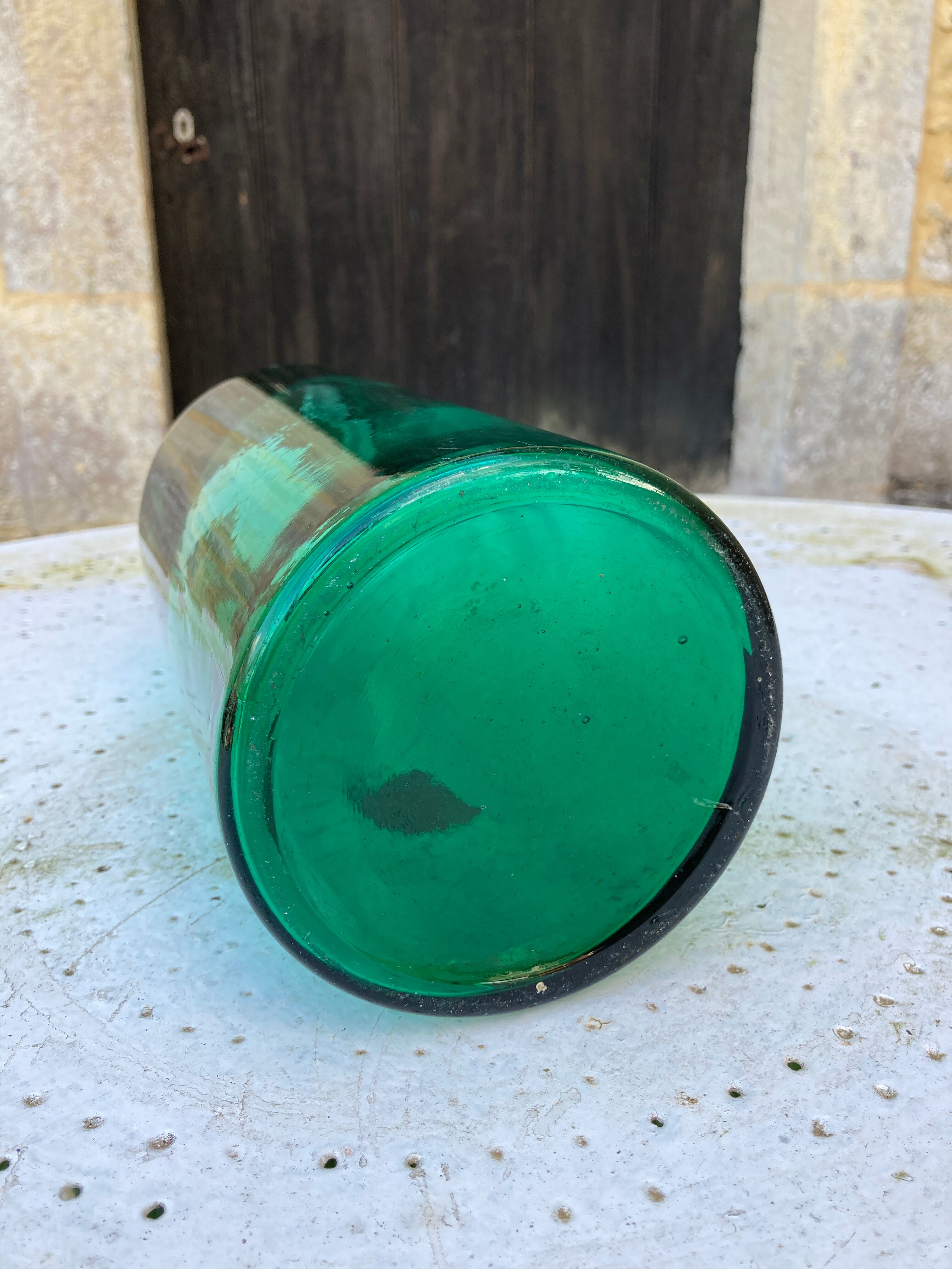 Large green glass jar