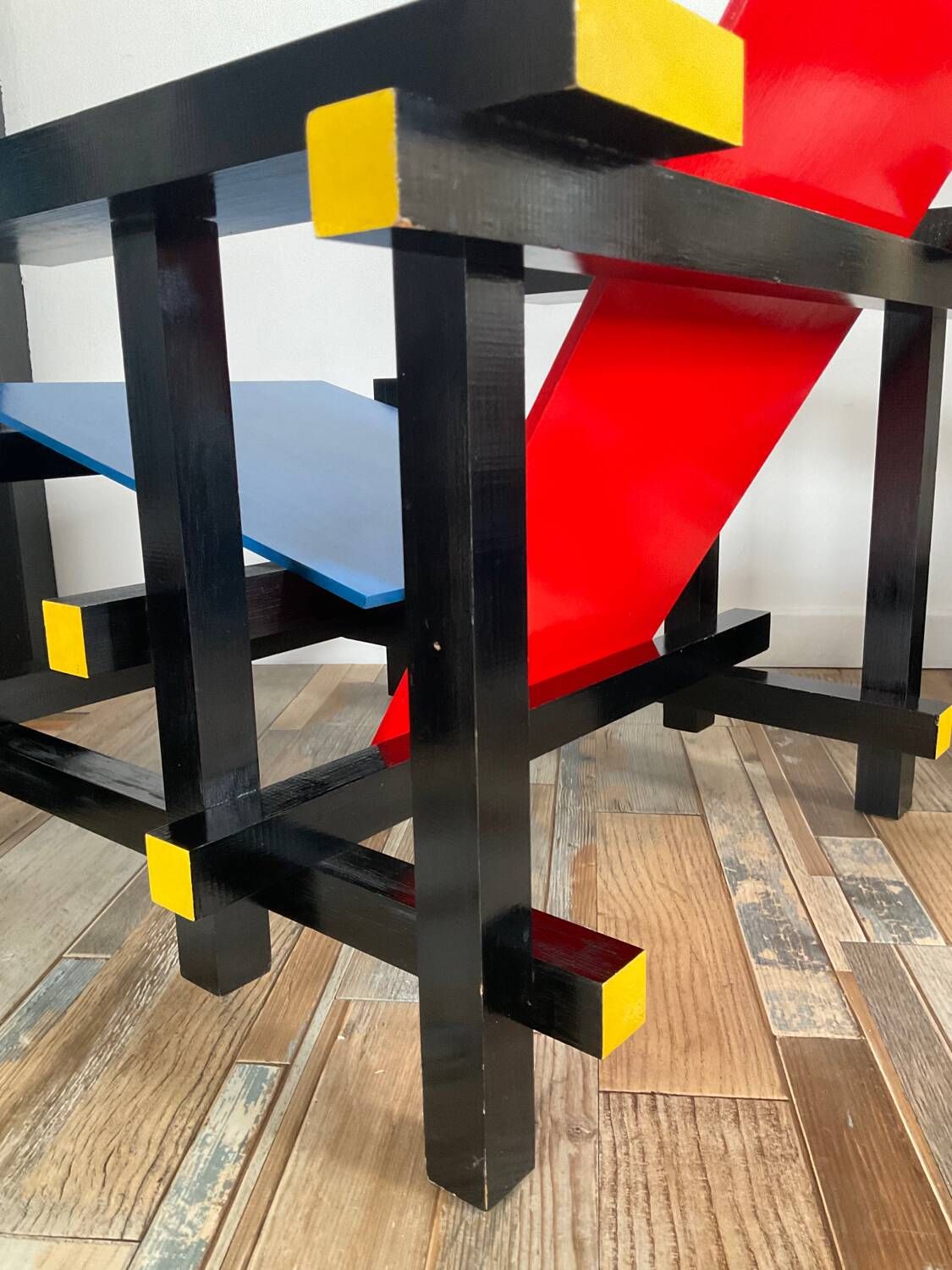 “Red and blue” lounge chair in the style of Gerrit Rietveld