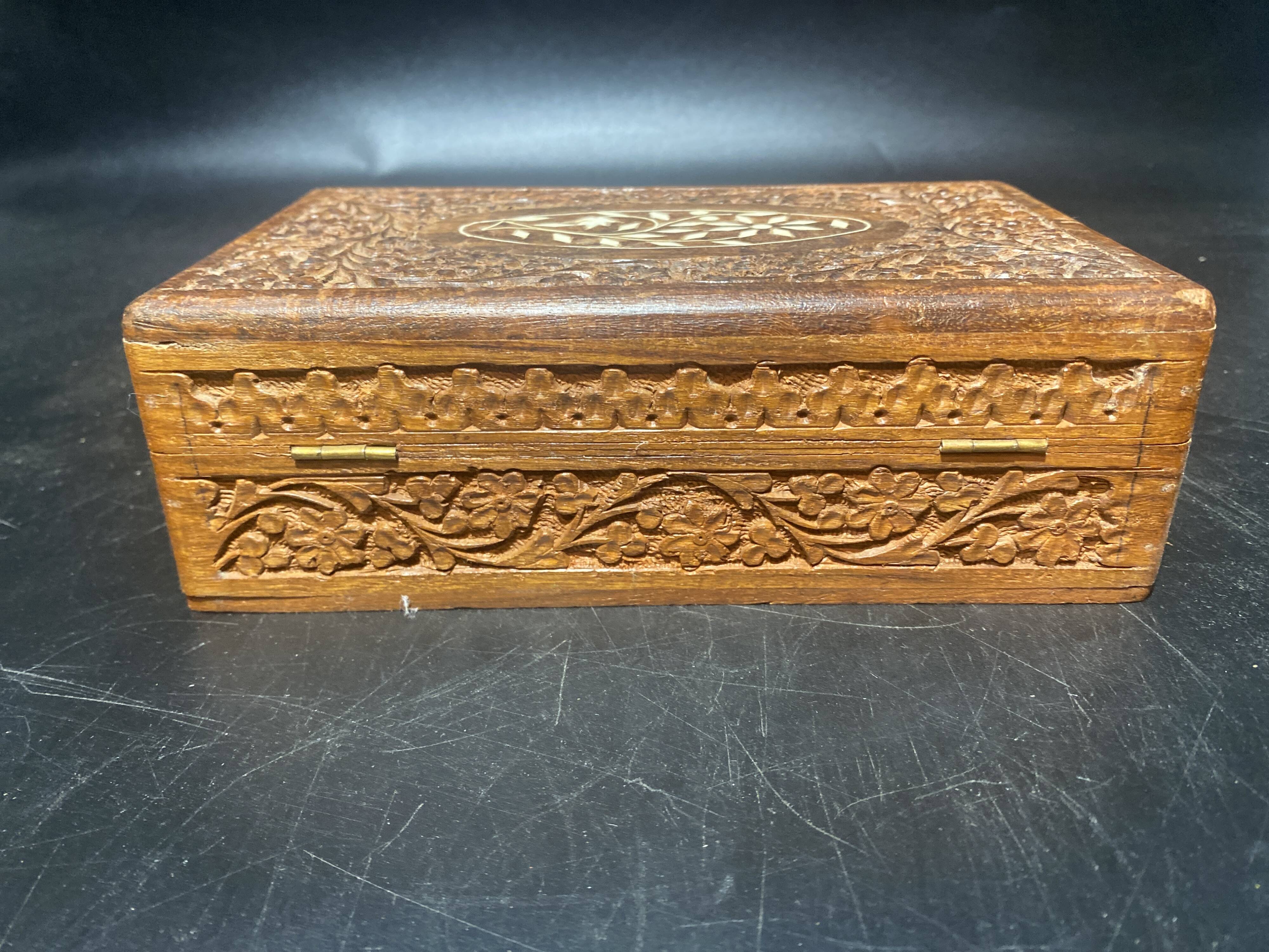 Carved wooden box