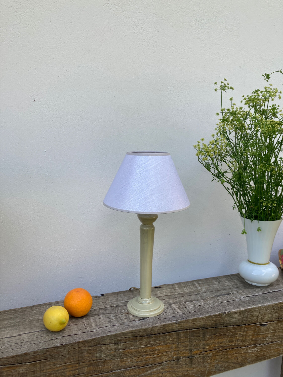 Beige ceramic lamp and iridescent white lampshade