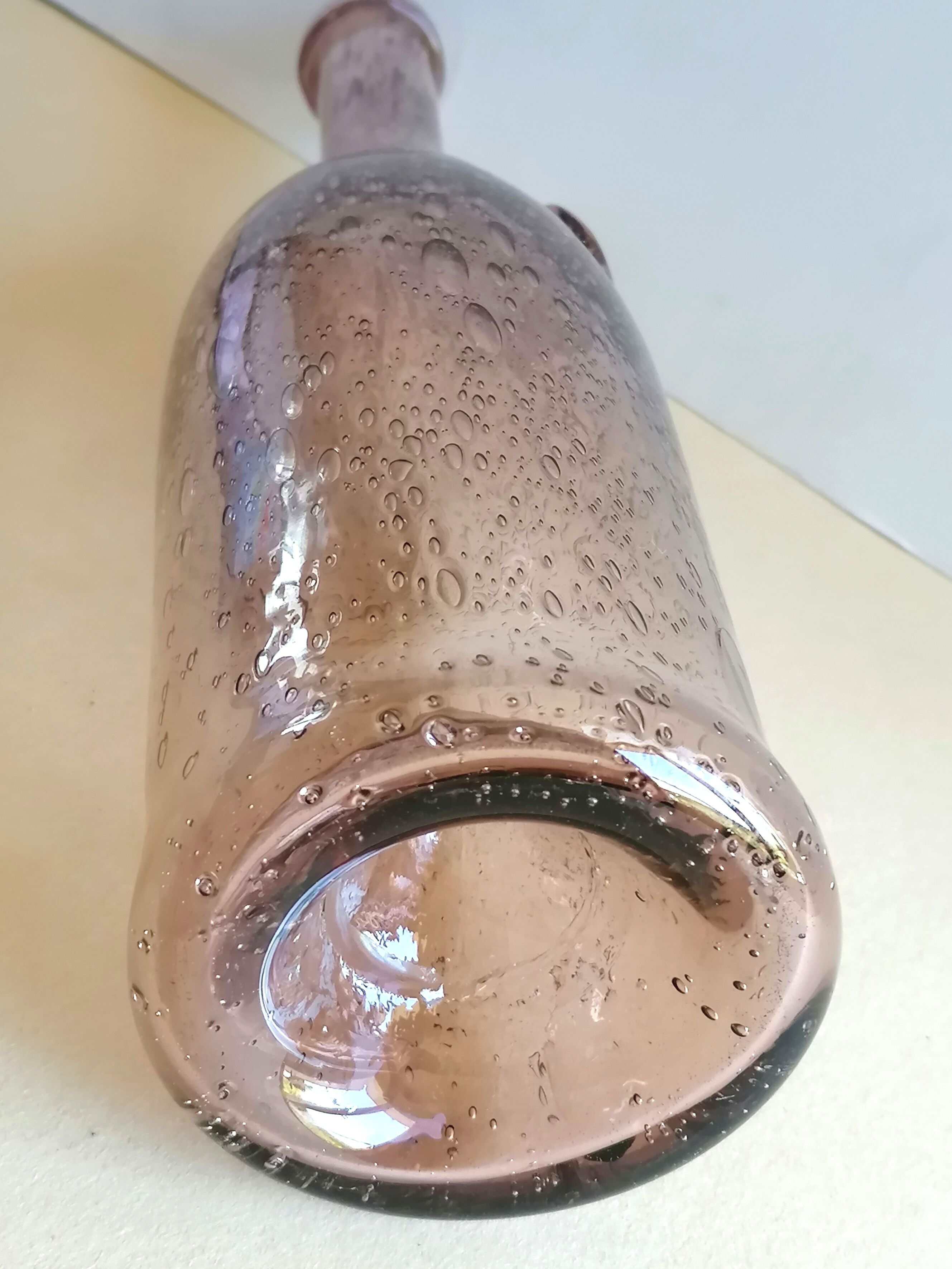 Biot bubble glass bottle