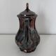 Metallic porcelain coffee pot