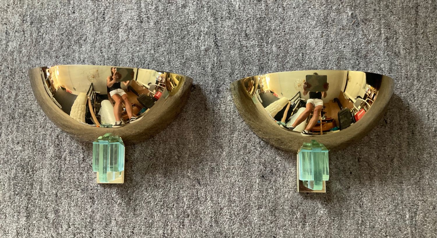 Pair of Hollywood Regency half-moon wall lamps in gilded metal and plexiglass