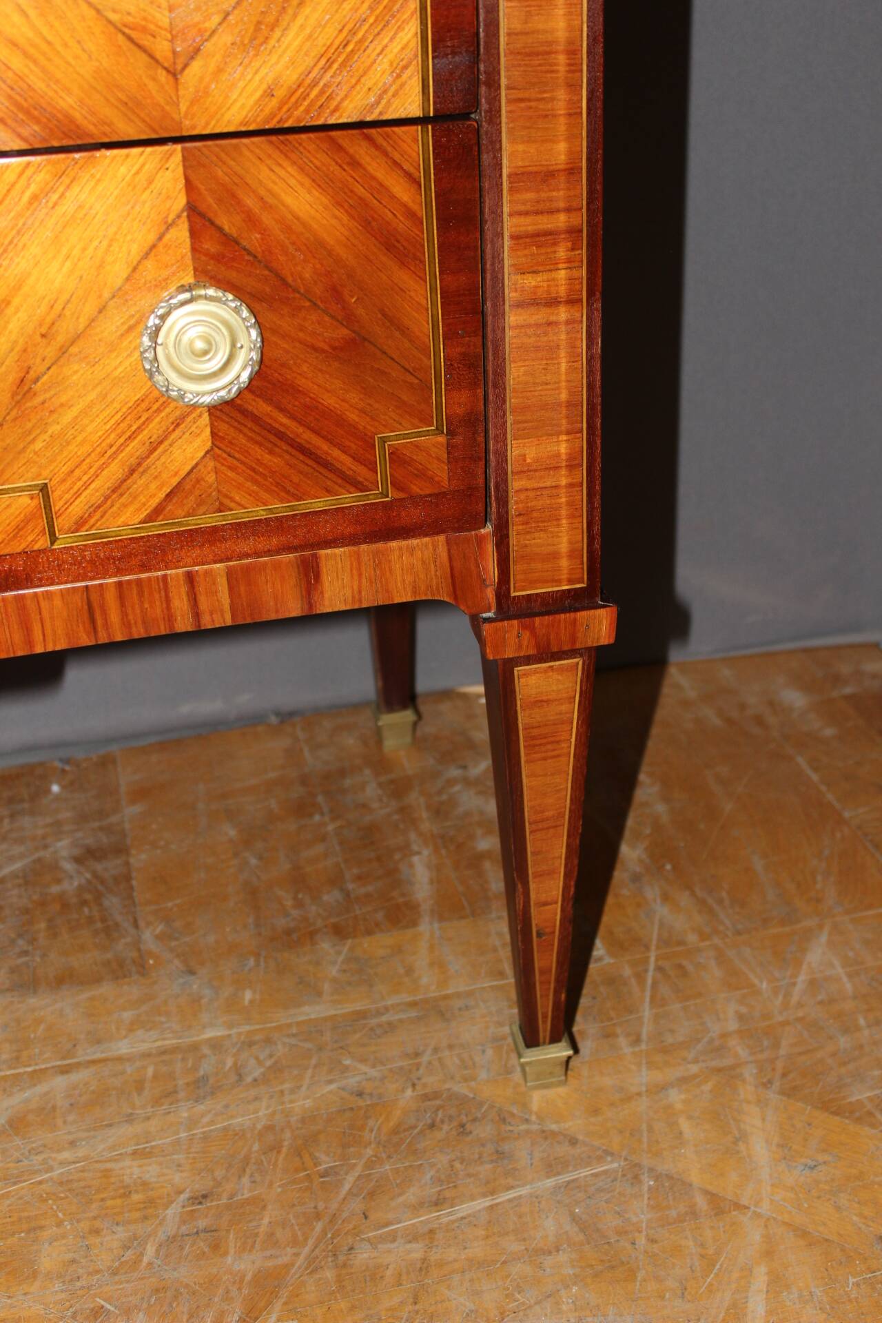Louis XVI style commode in marquetry from around 1940.