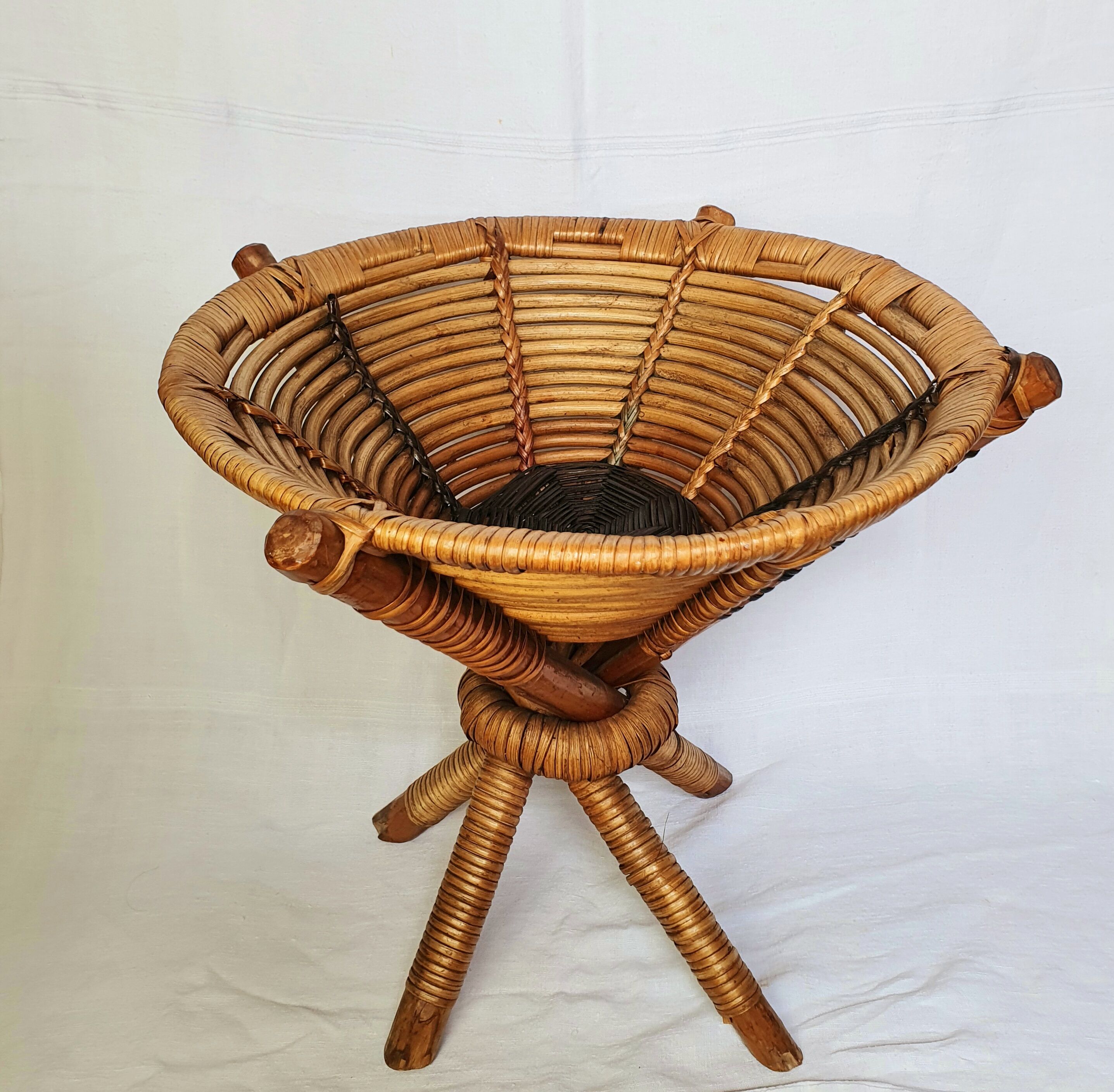Basket on wooden and woven wicker legs 1950