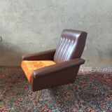 Vintage armchair in skaï