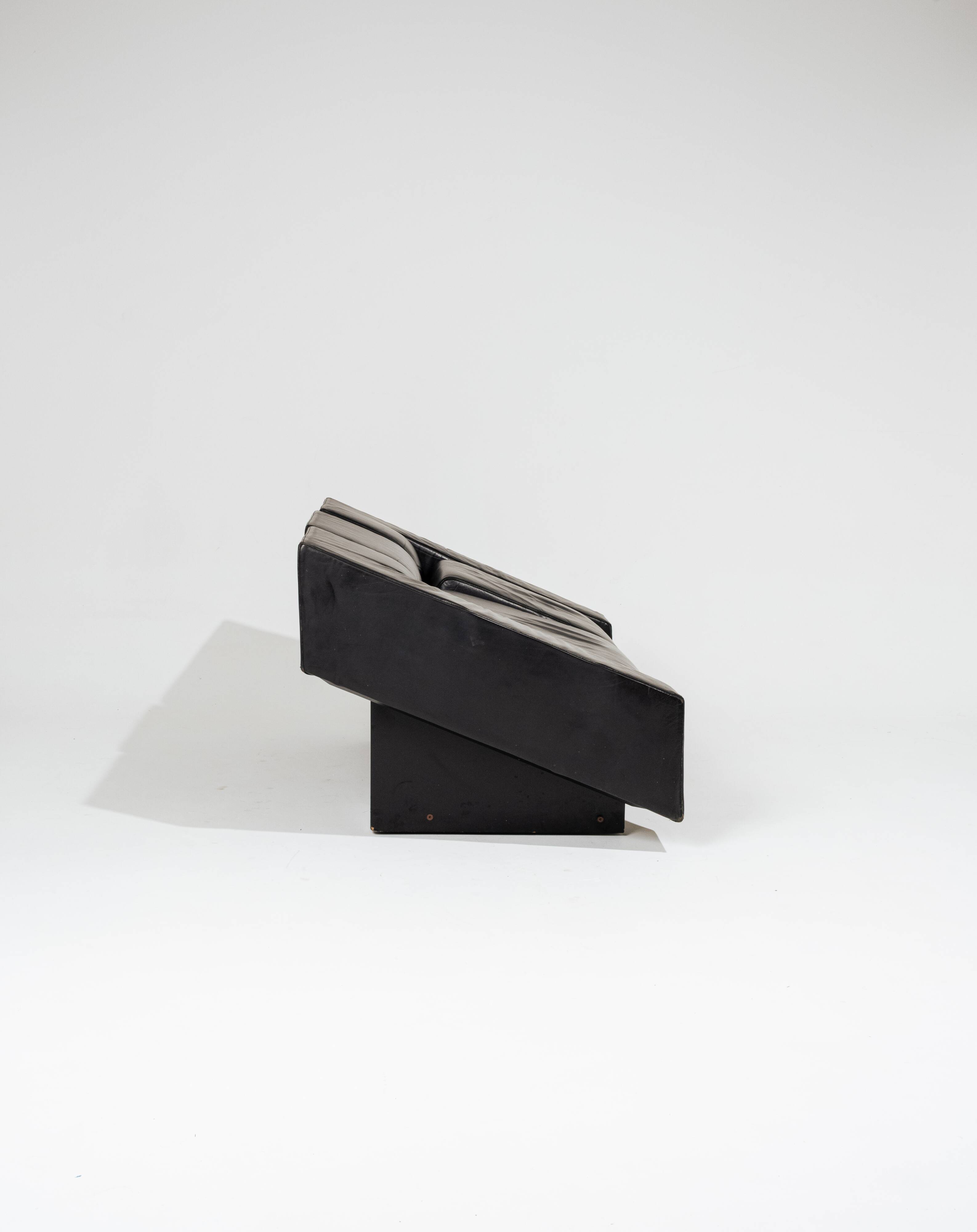 Obliqua two-seater leather sofa, Mario Botta, 1980s