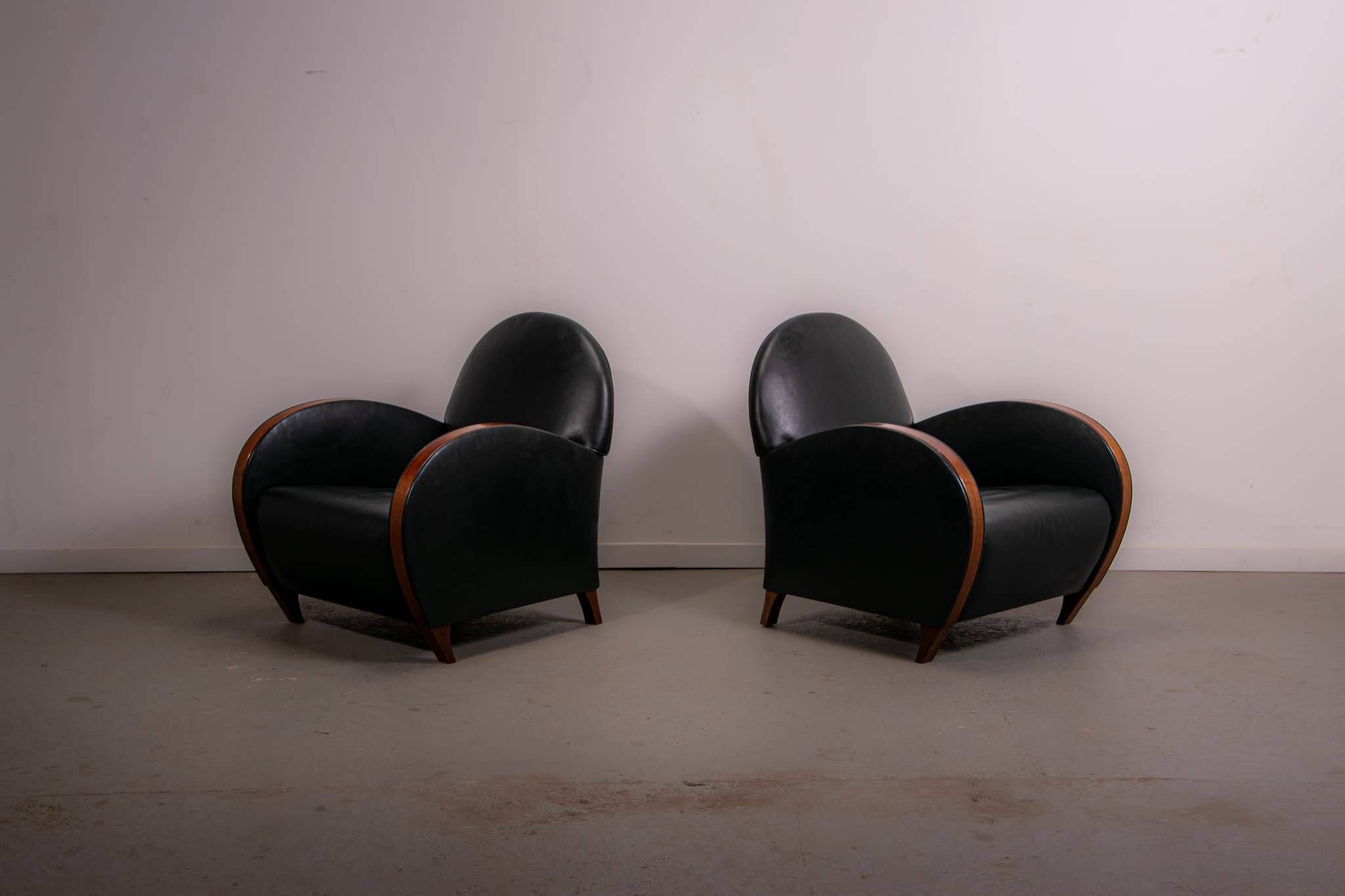 Pair of mid-century leather armchairs, circa 1970, made in Belgium.