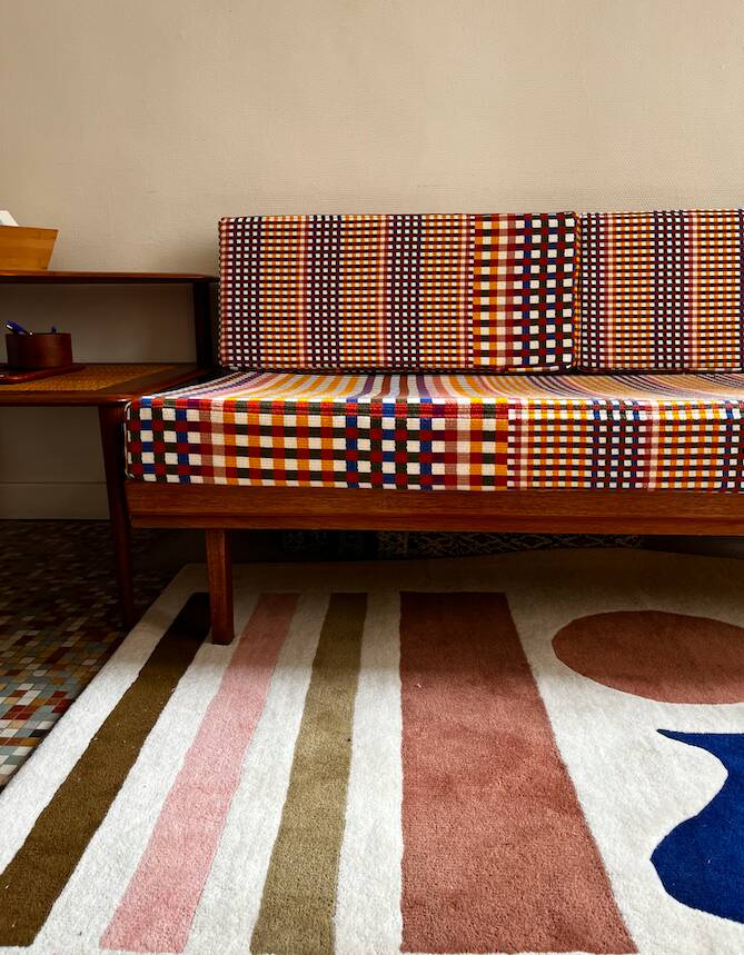 Peter Hvidt Knoll wooden banquette sofa with new cushions.