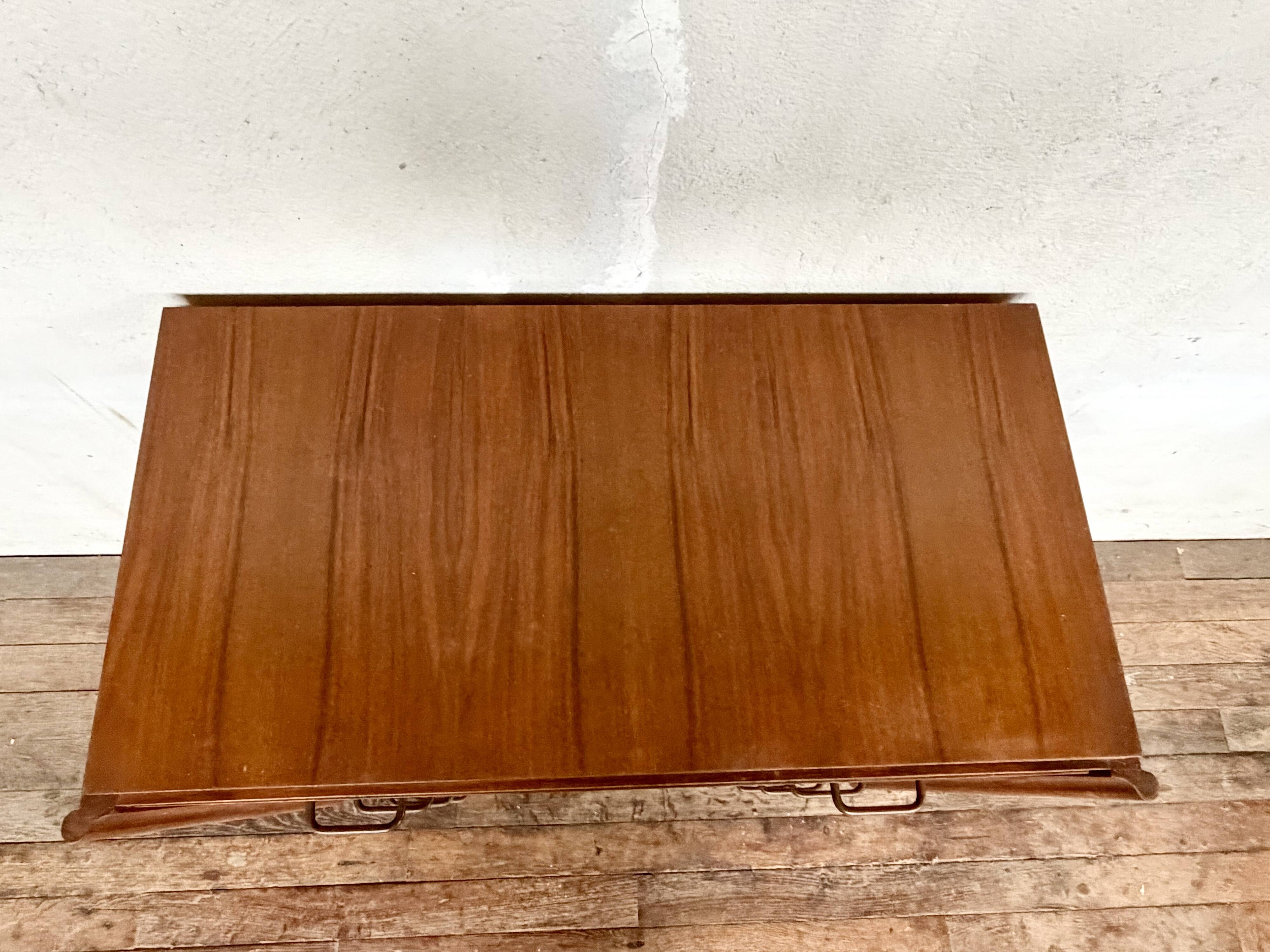 Art Deco vintage commode with tapered legs.