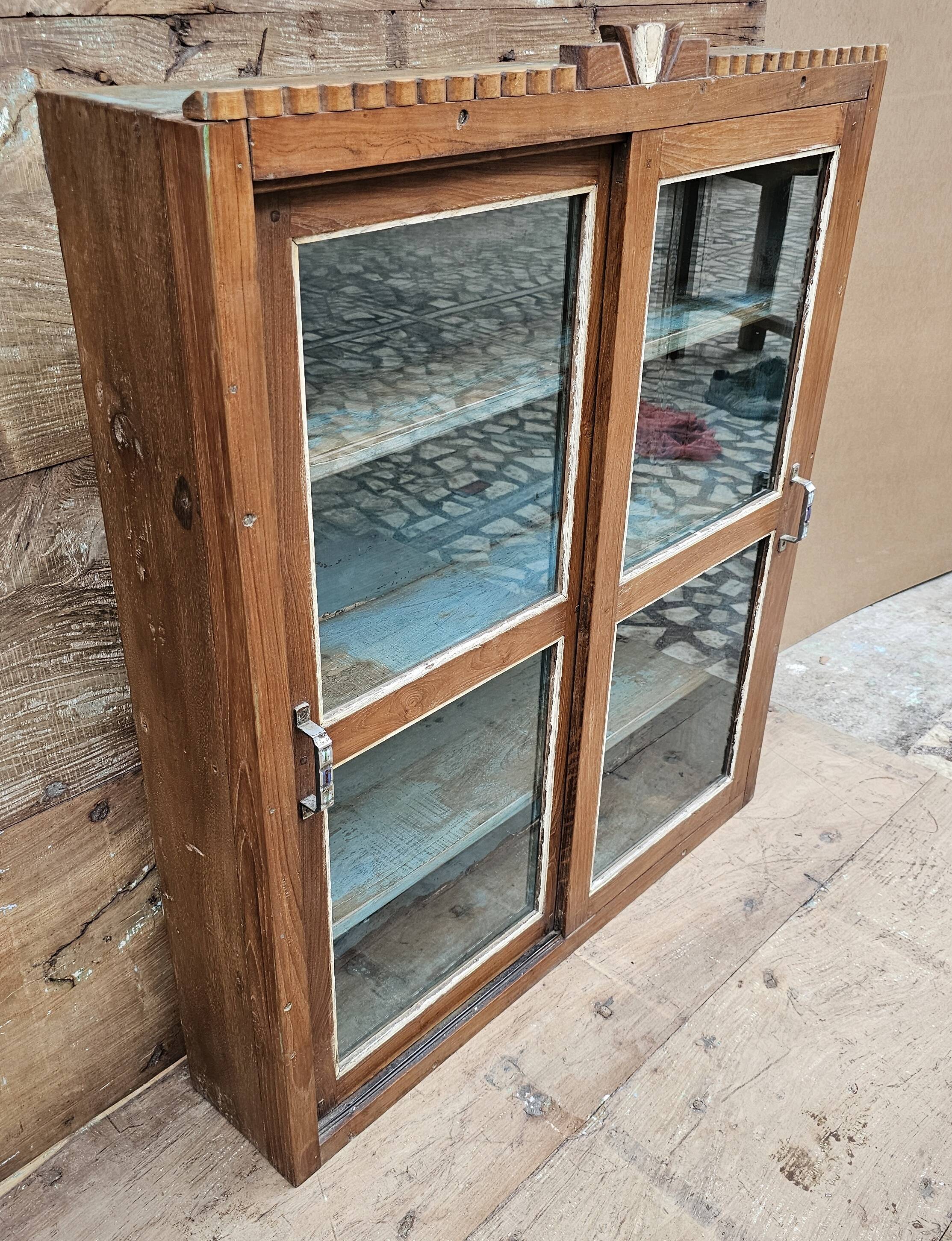 Old Art Deco display case in Burmese teak