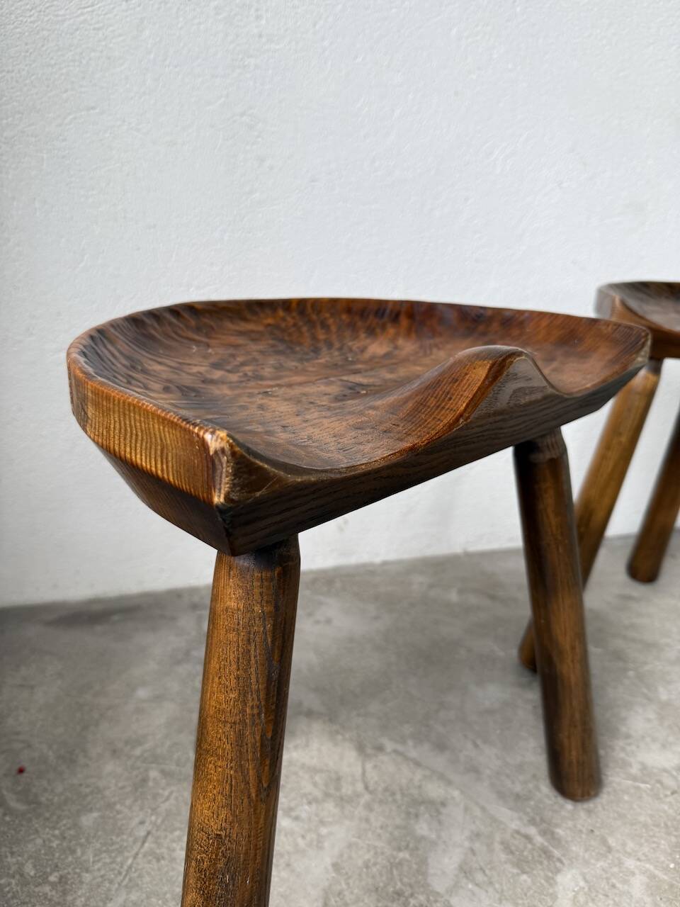 Pair of Le Selou tripod shepherd's stools