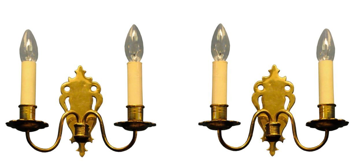 Pair of brass wall sconces by Schroder & Co