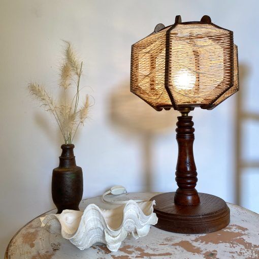Wooden lamp and stretched wires