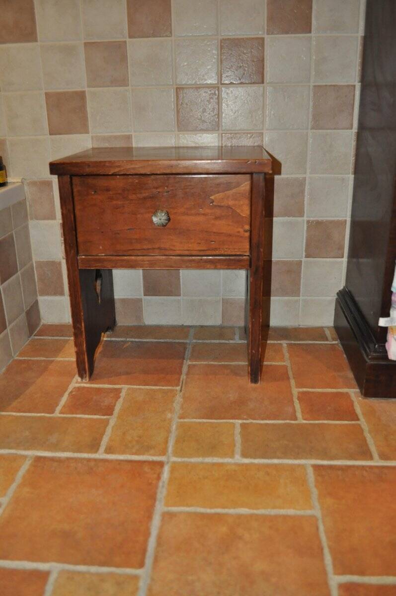 Vintage brown poplar wardrobe from the 1960s — compact accent piece, understated style.