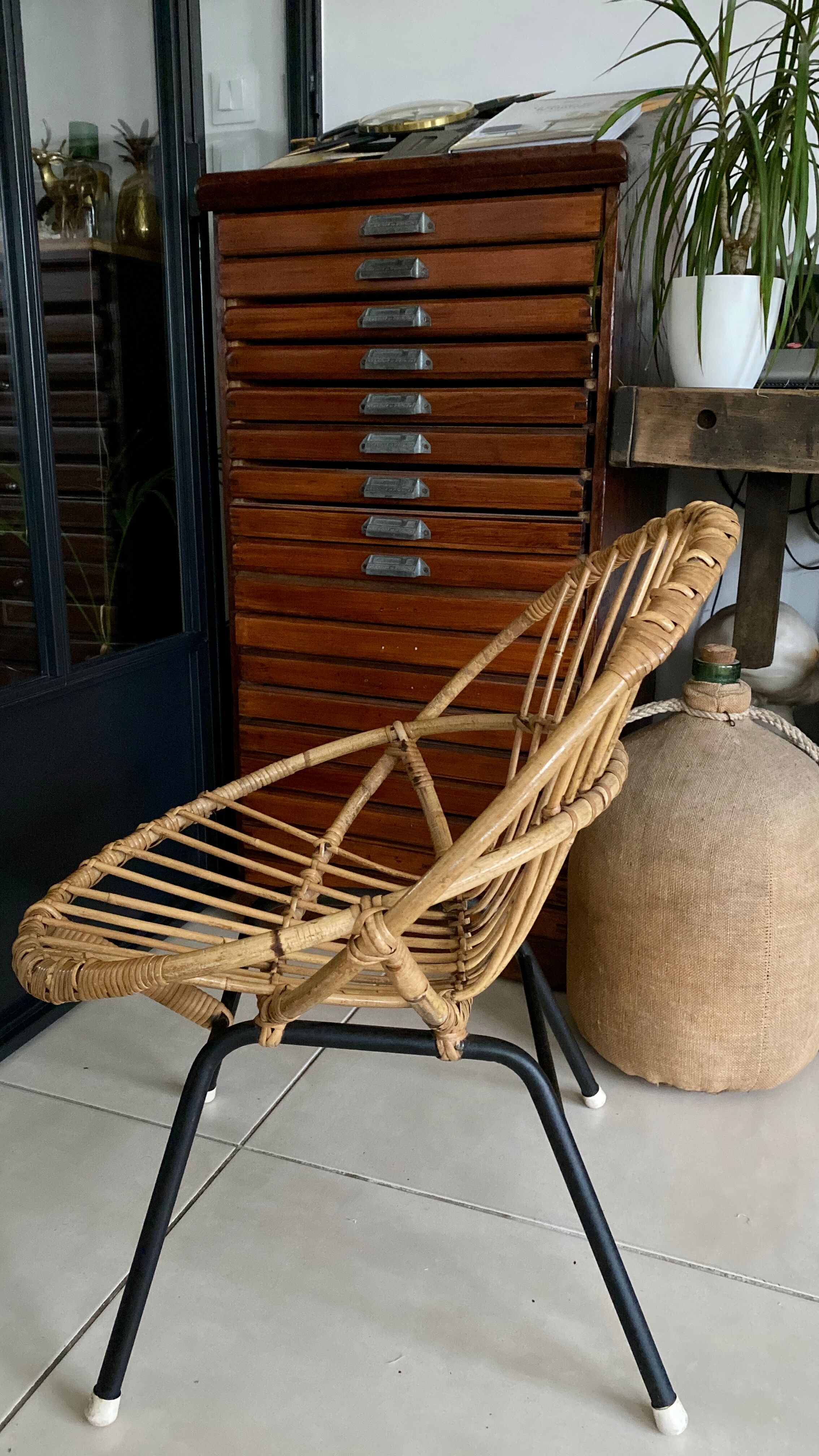 Old vintage metal foot rattan chair