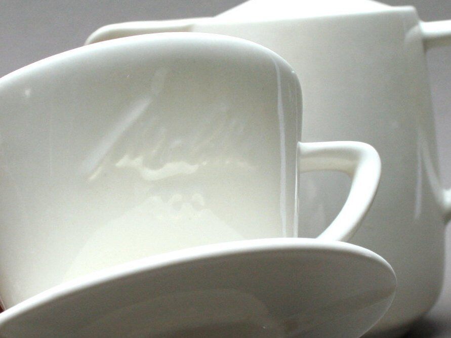 White ceramic coffeemaker and melitta filter, 60 years