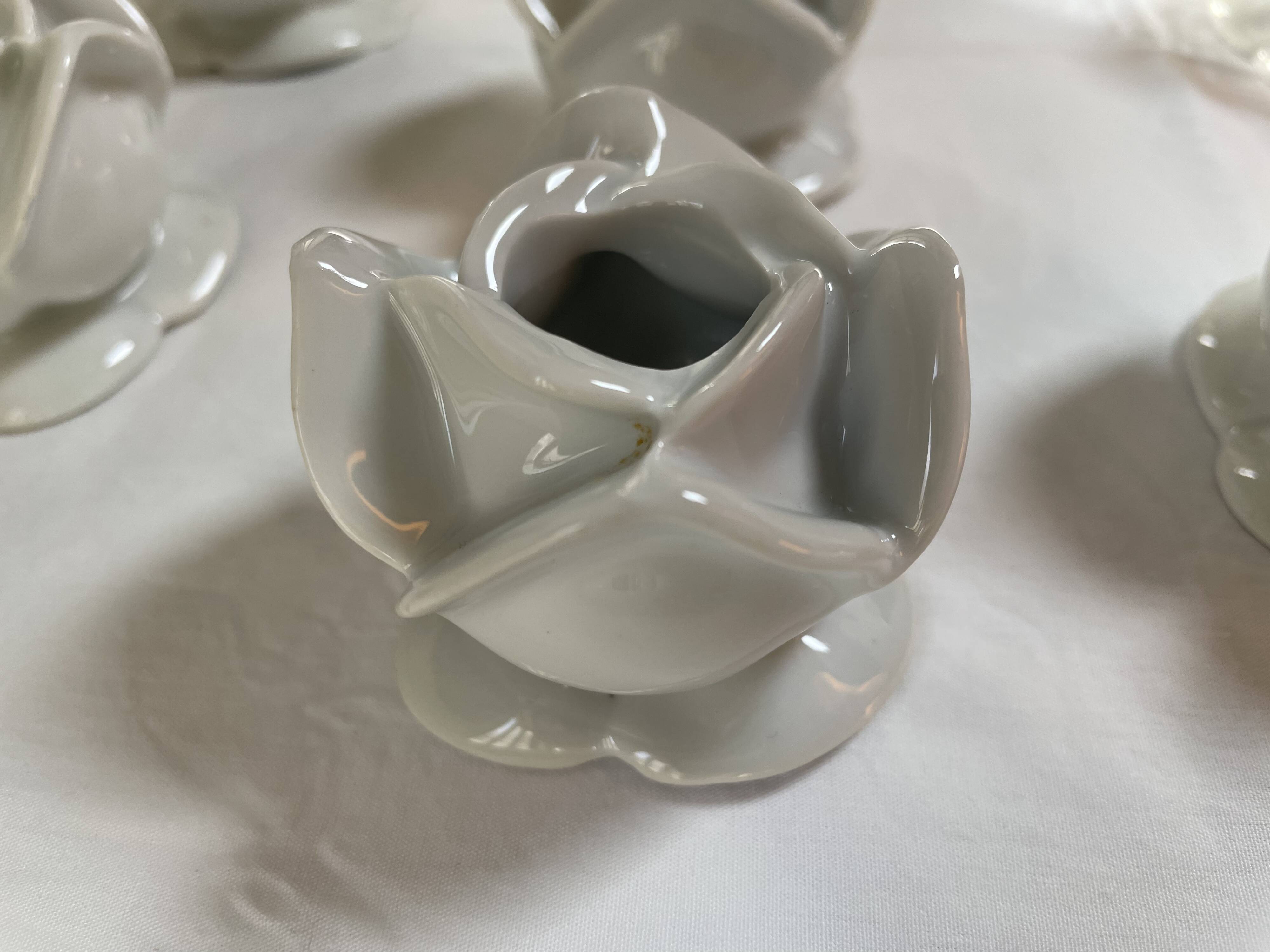White porcelain rose shaped candle holders
