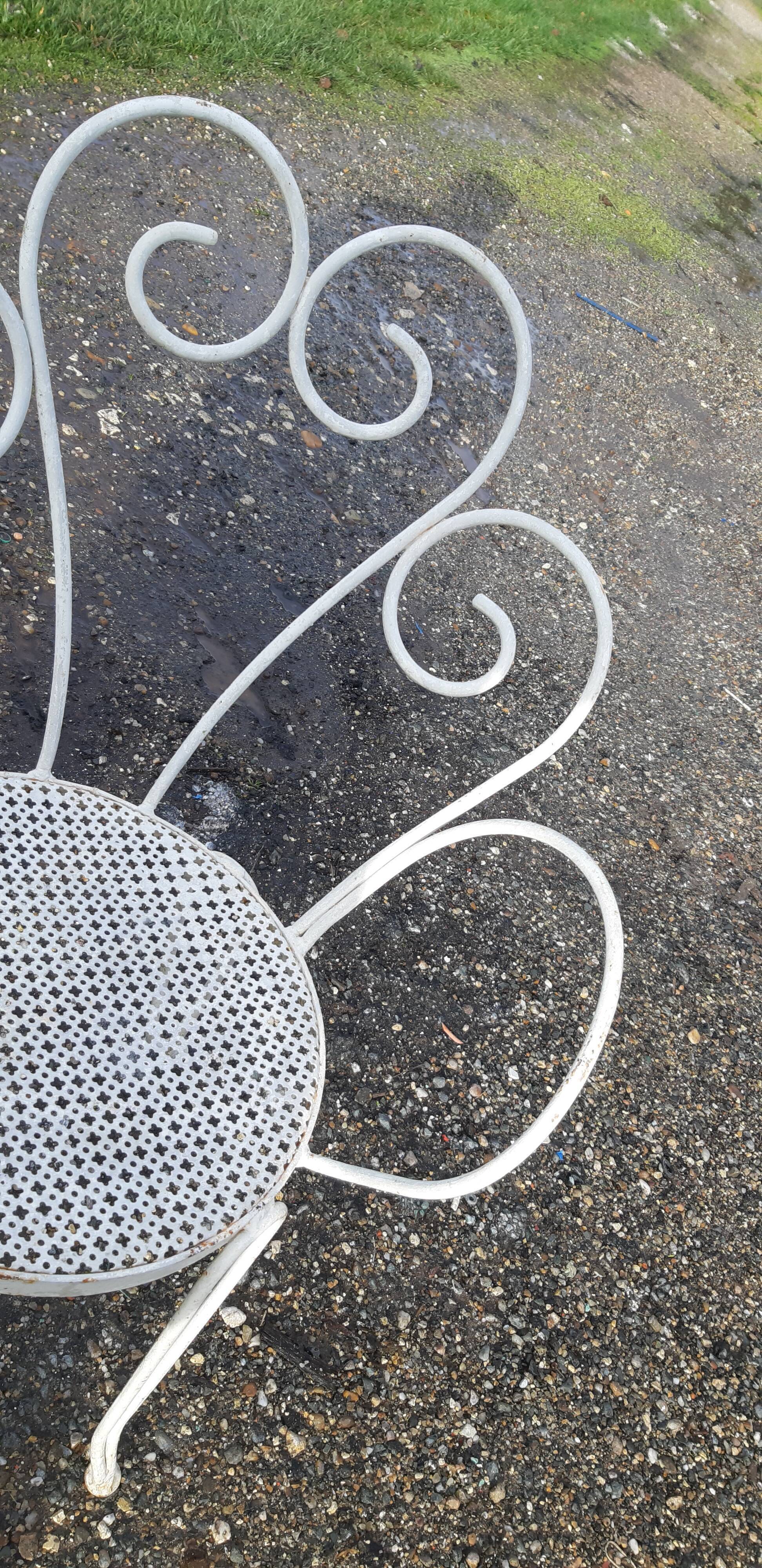 Paire de fauteuils de jardin 1900 en fer forgé