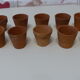 10 terracotta pots