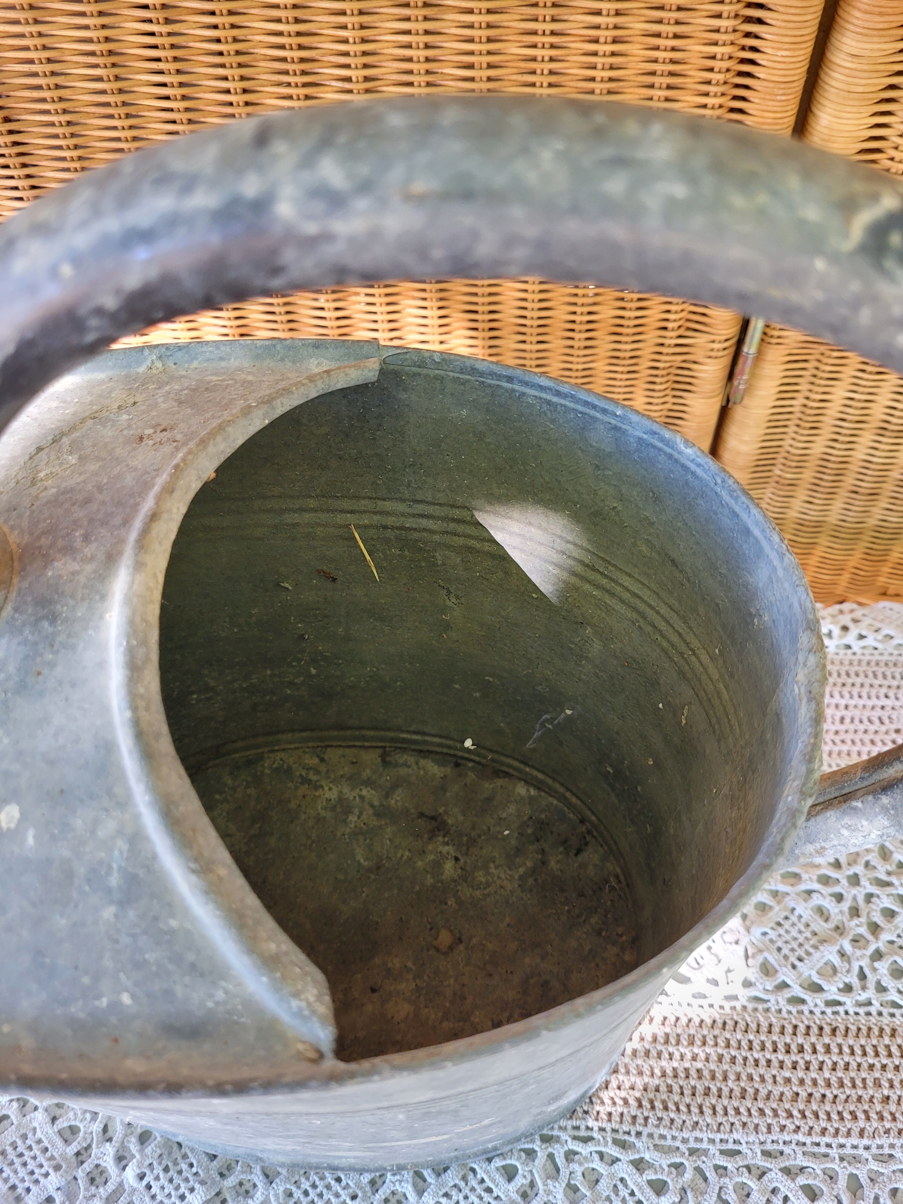 Zinc watering can with pommel