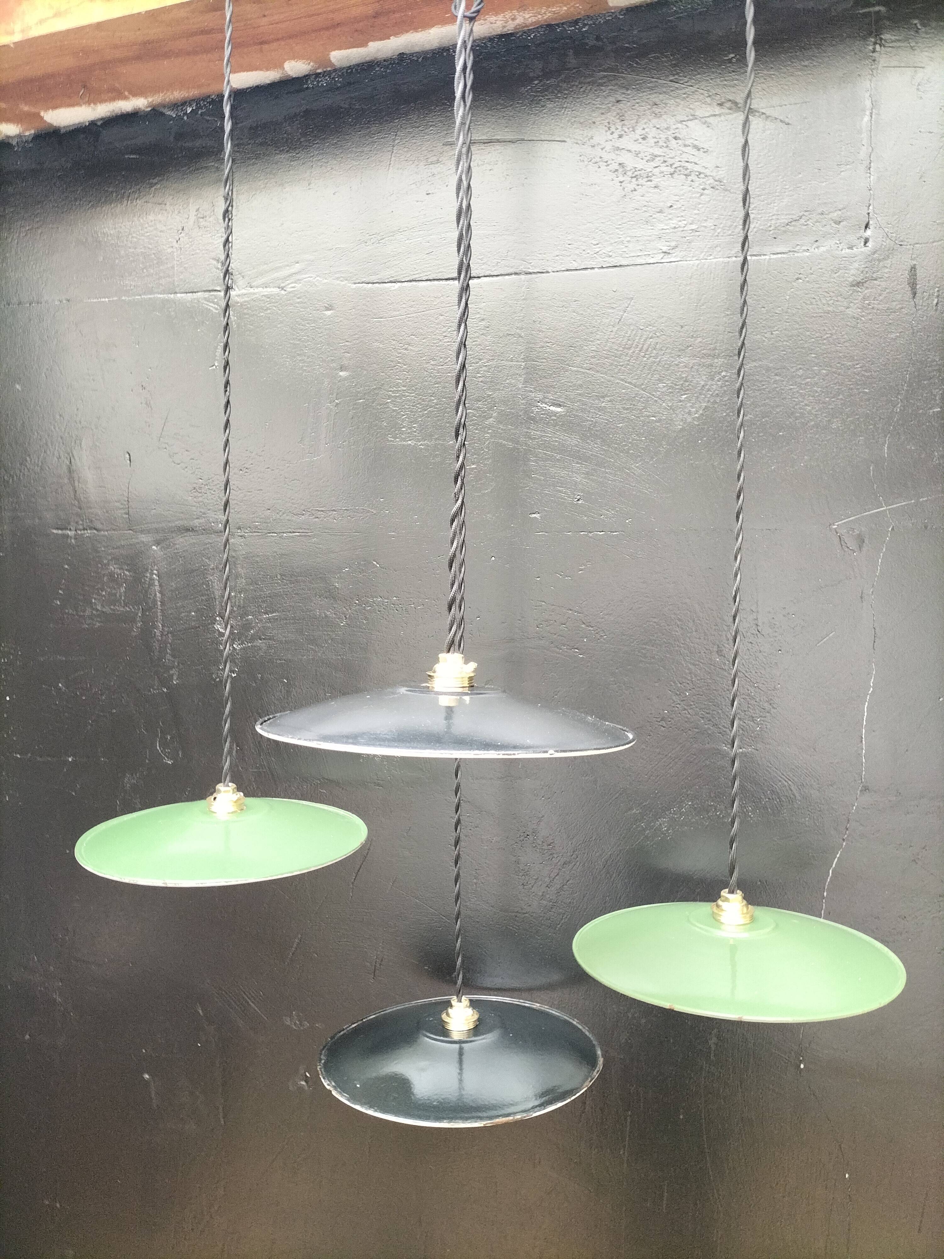 4 enameled sheet metal pendants