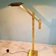 Brass articulated chandelier with counterweight, Hollywood Regency style, 1970-80.