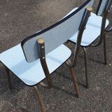 2 sky blue Formica chairs