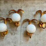 Pair of palm leaf wall lights in Hollywood Regency style with opaque globes by Hans Kögl, Germany, 1970s.