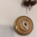 Varnished wood and brushed brass pepper mill