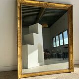 Golden mirror style Restoration decorated with stretched palmettes
