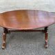 Large oval coffee table in solid wood 133x93cm