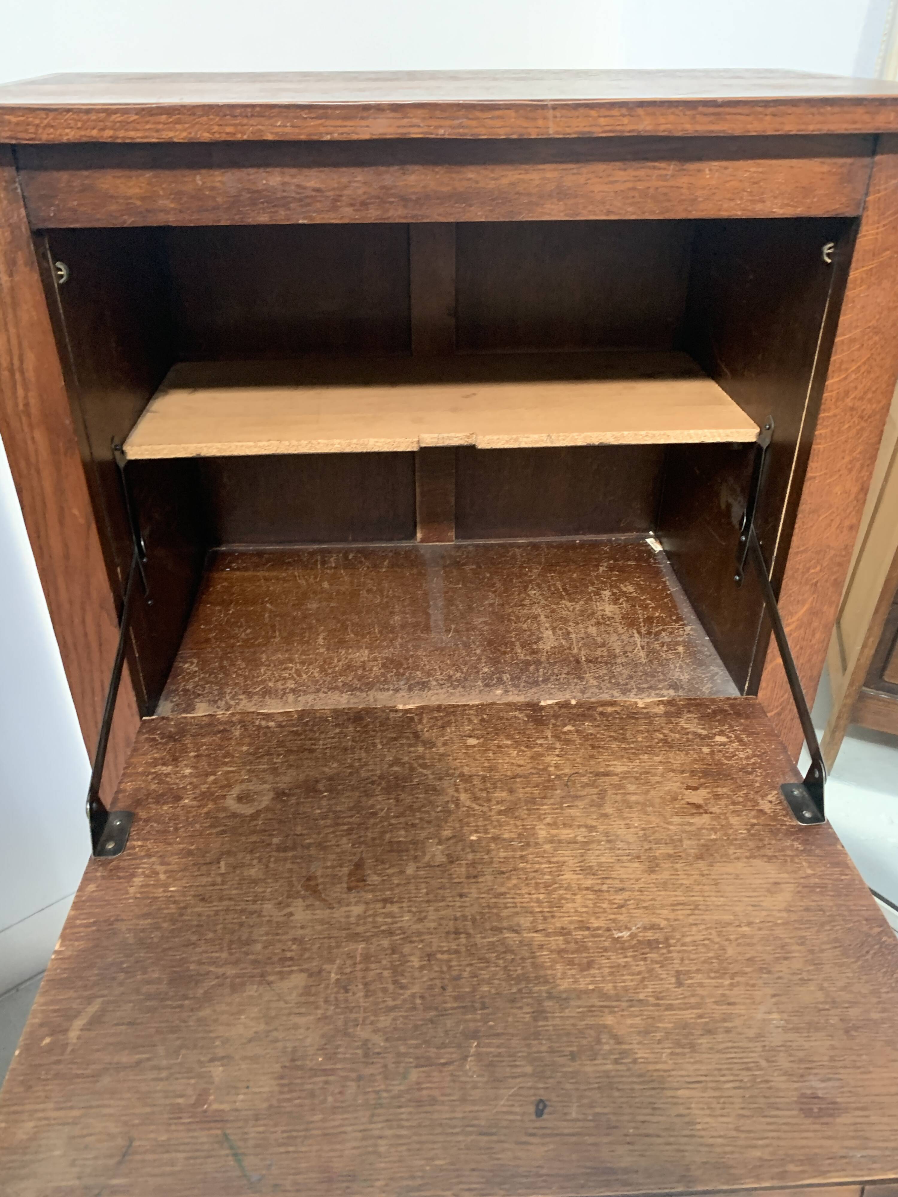 20th century natural wood and metal plate secretary desk