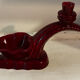 Ruby red ceramic pocket ashtray from Vallauris, numbered.