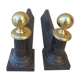 Pair of cast iron and bronze chenets