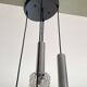 Large cascading chandelier with 5 glass lampshades and aluminium tube.