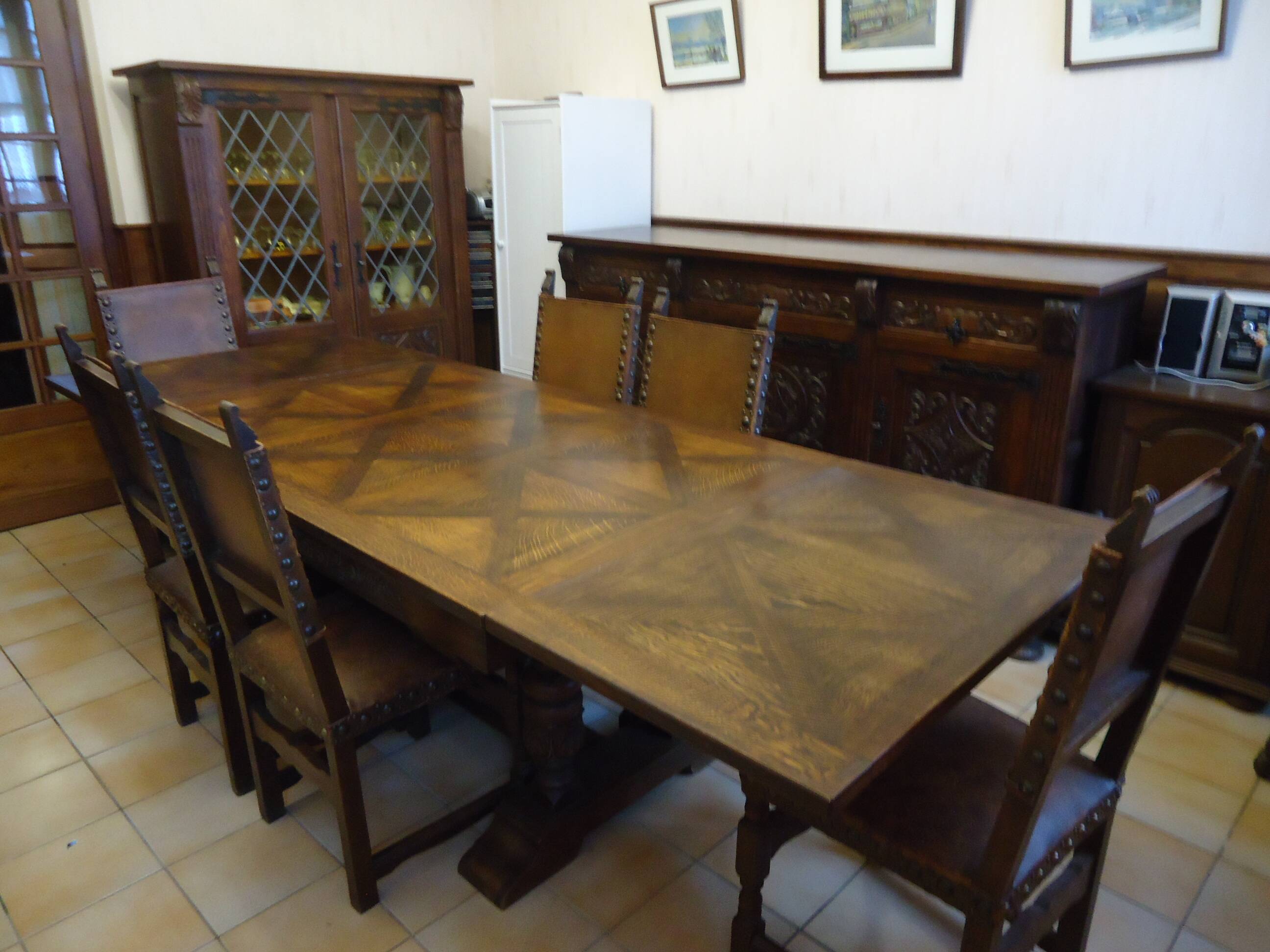 Dining table and 6 solid wood chairs from the 1950s.