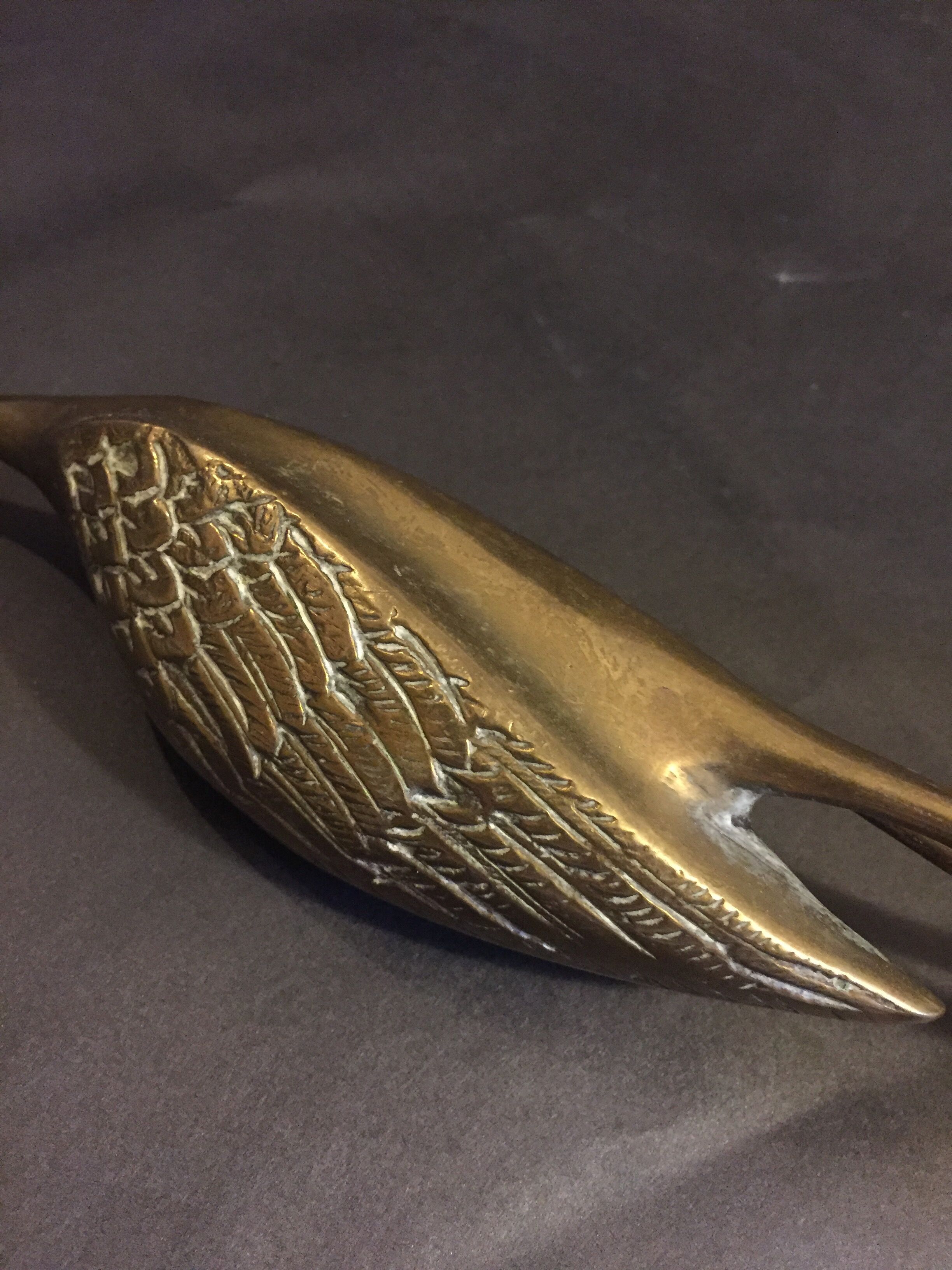 Brass heron