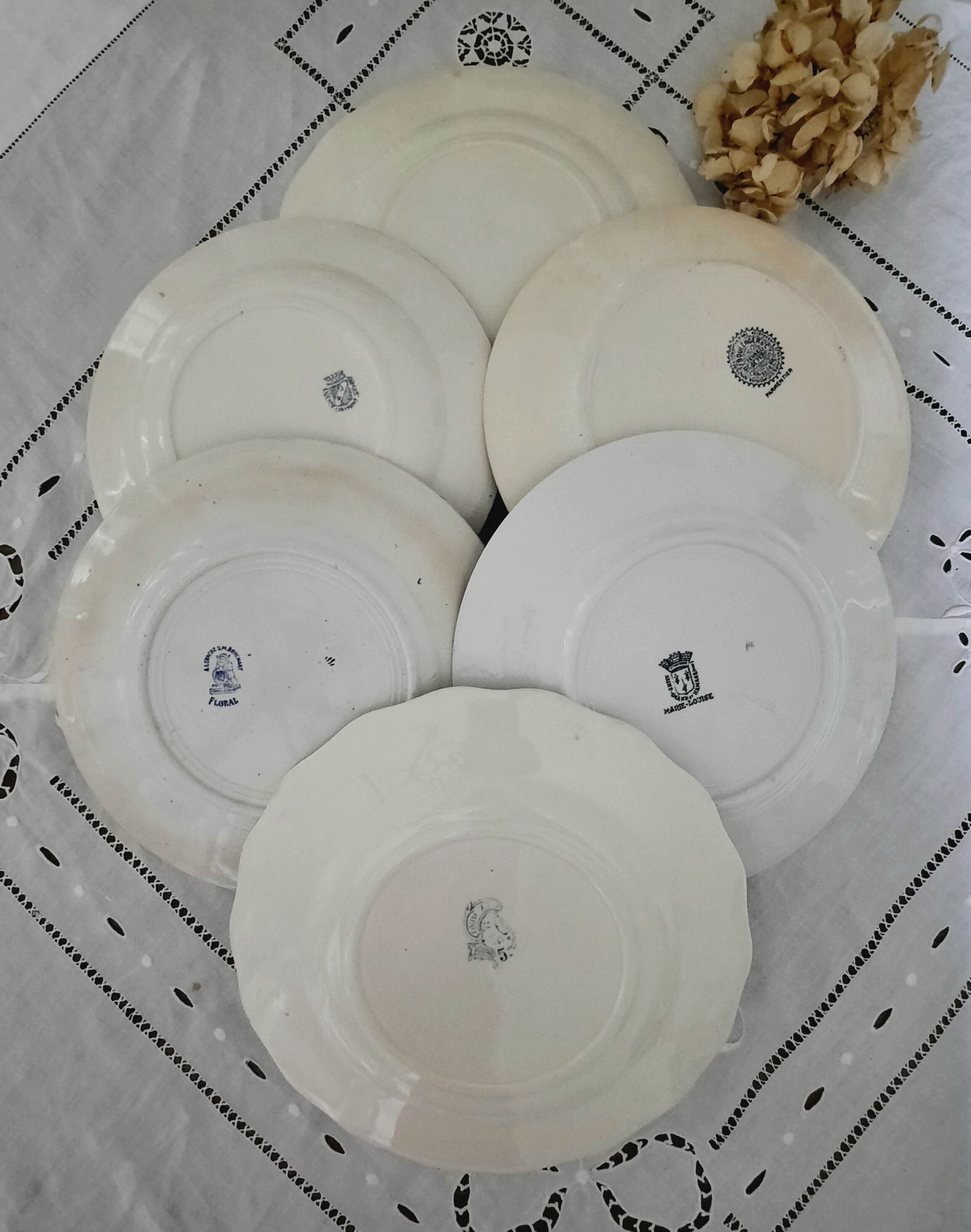 Old flat plates mismatched in earthenware