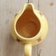 Vintage yellow ceramic milk jug