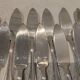 11 silver-plated fish forks and 11 fish knives by silversmith Ercuis Nil