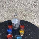 Liquor service consisting of a carafe and 6 small shot glasses, vintage houndstooth pattern