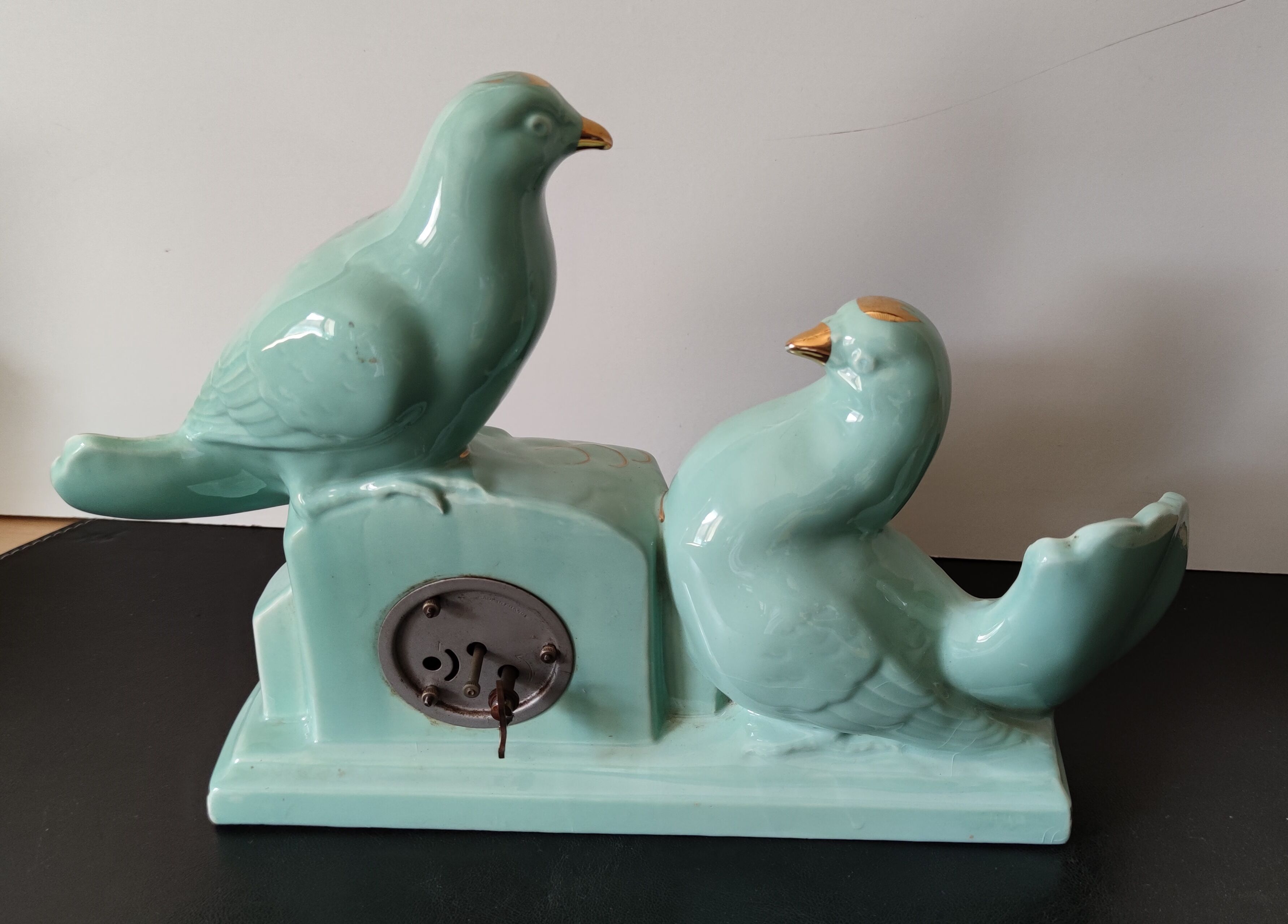 Fireplace clock with matching vases