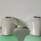 Duo of wall lamps in porcelain and green opaline