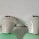 Duo of wall lamps in porcelain and green opaline