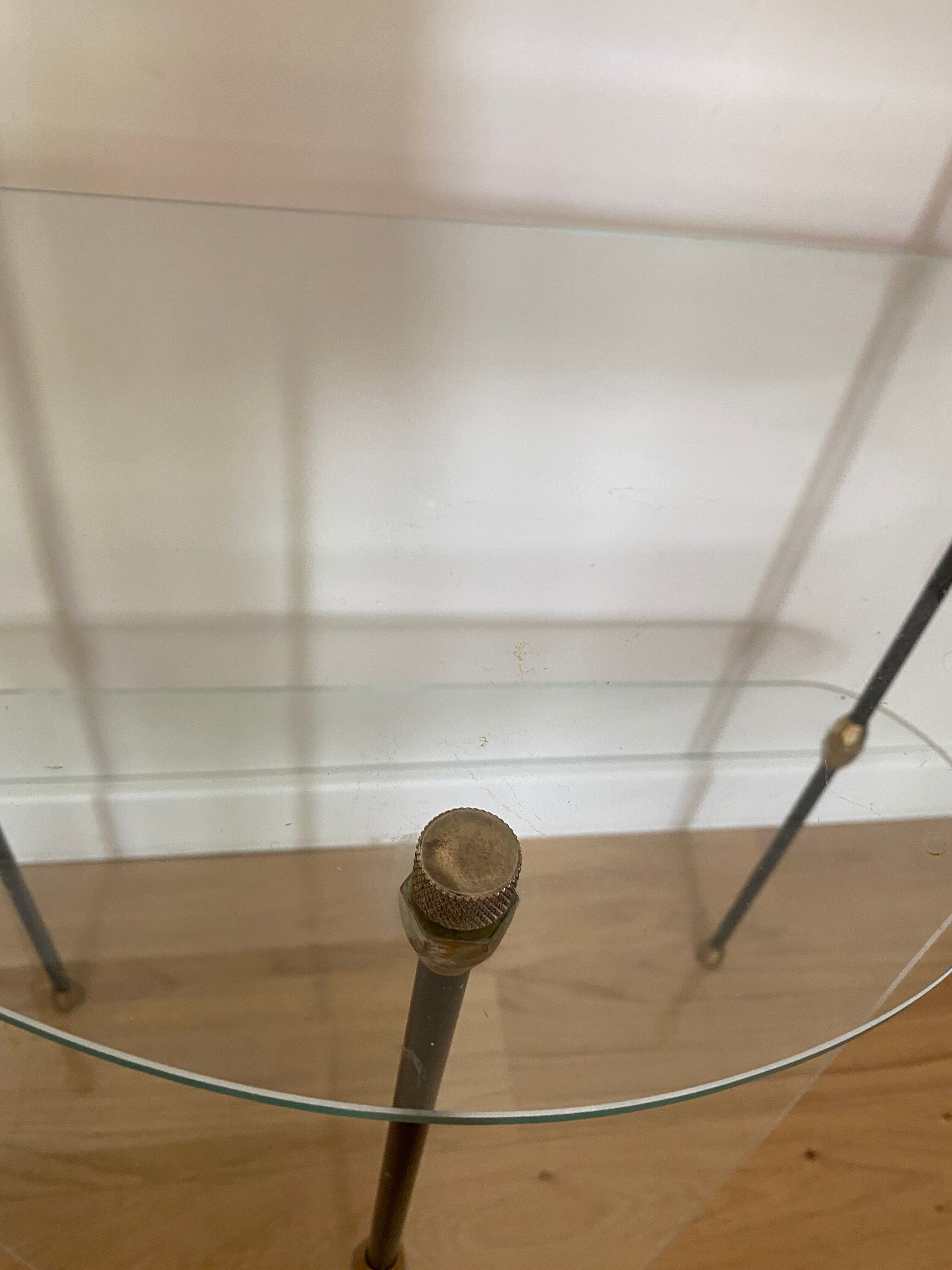 Glass and iron tripod console 1950