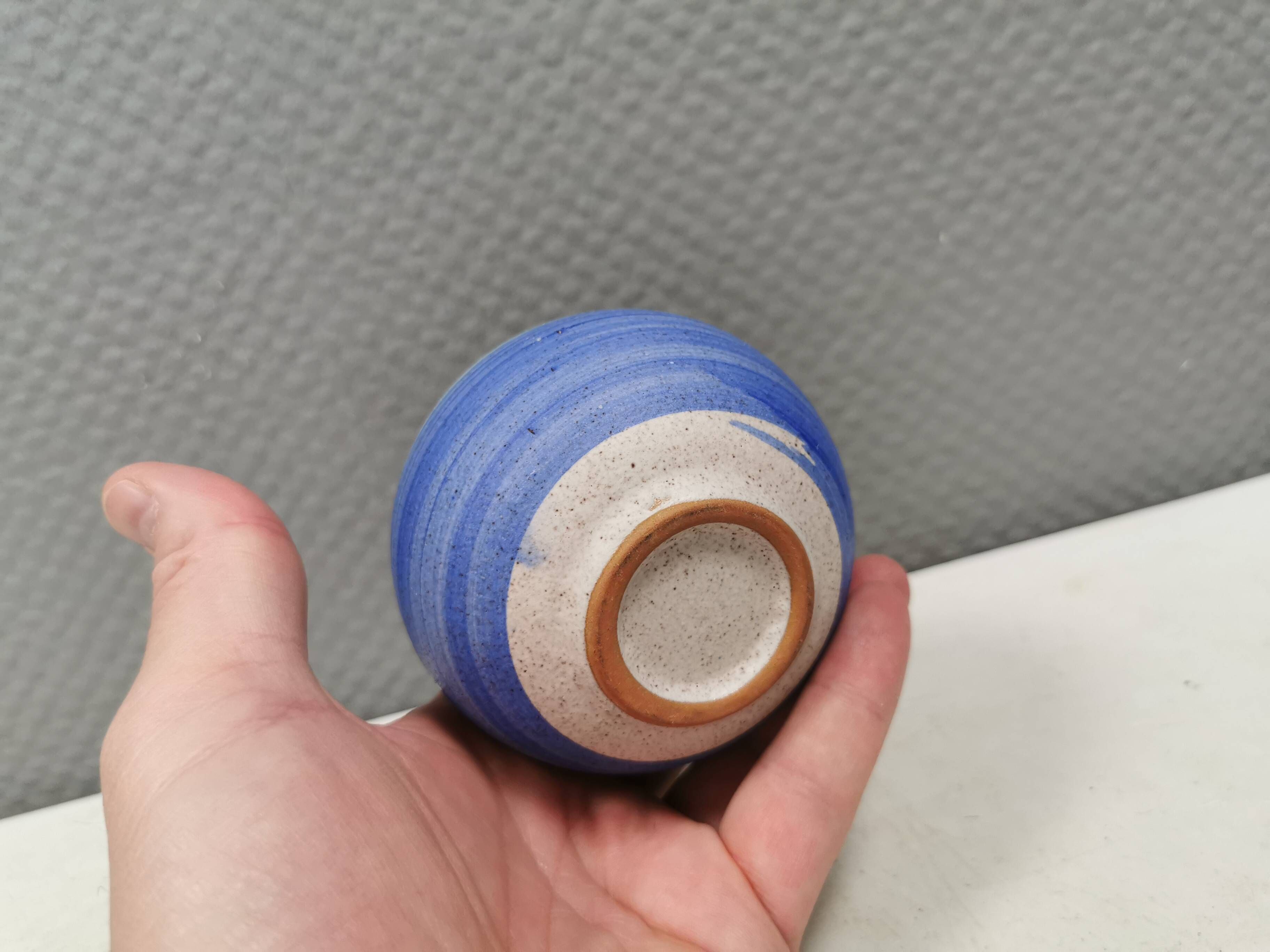 A small, round, beautiful ceramic vase from Denmark, dating from the 1980s.